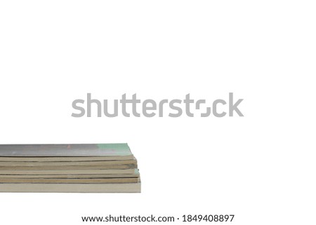 Seven books on white background