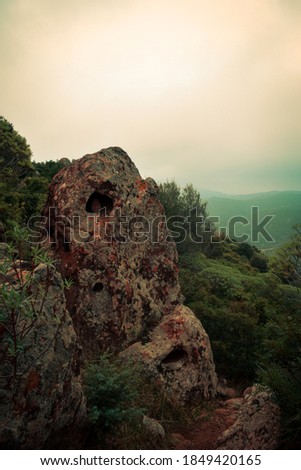 Moody/Mystic picture of a rock in sardinia. Summer Holiday.