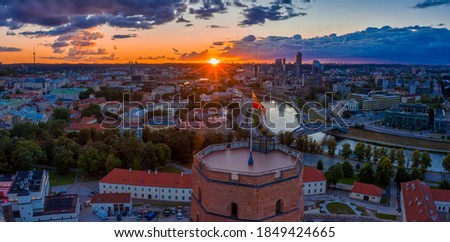 Beautiful Vilnius old city panorama at sunset. Magical sunset over the city. View form the old town near cathedral.
