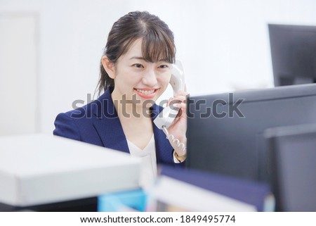 Asian businesswoman working at the office Royalty-Free Stock Photo #1849495774