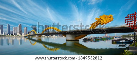 Dragon bridge and Administrative Centre which is considered as an icon of Da Nang city. Royalty-Free Stock Photo #1849532812