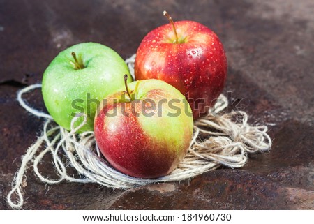 Three Ripe Apple on Stone