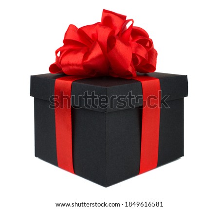 Black friday gift, paper box with red silk big round ribbon bow isolated on white background