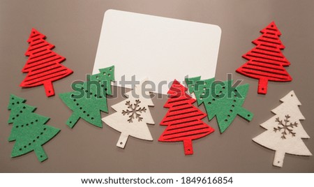 Christmas trees decoration with blank card. Holiday greeting.
