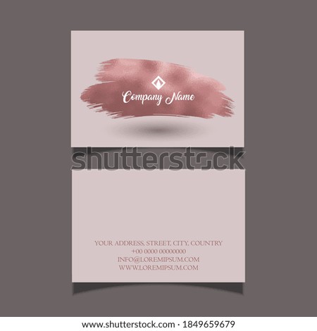 Elegant business card with a rose gold brush stroke design 