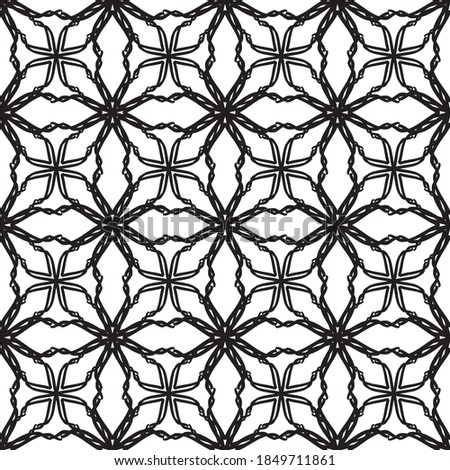 Seamless abstract pattern.Black lace on white background.Black and white graphics. Imitation lace. For design and decoration of fabric, paper, Wallpaper and packaging.Grid pattern.