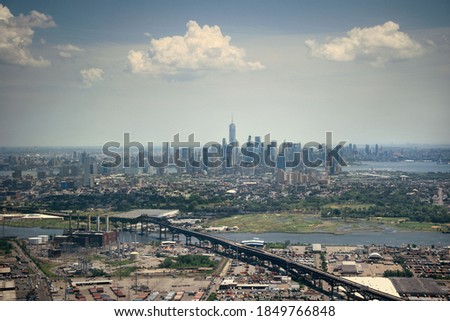 Downtown New York City aerial view with One World Trade Center and New Jersey