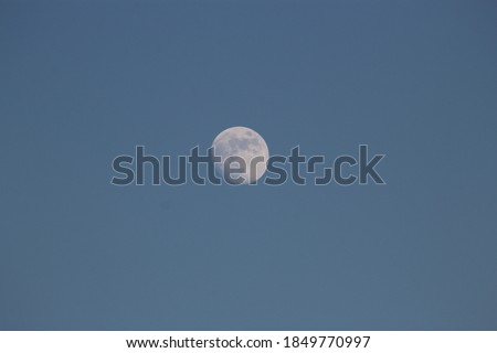 Full Moon in Blue Sky