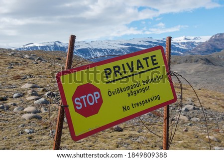 Sign telling that the land is private and that there is no trespassing allowed