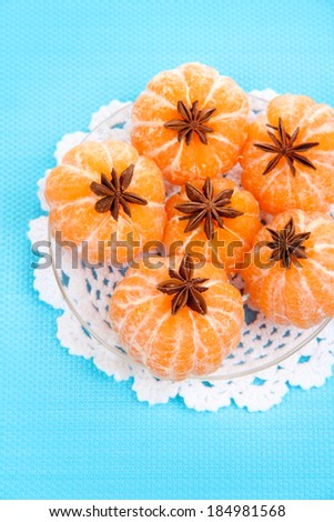 Ripe sweet tangerines, on color background