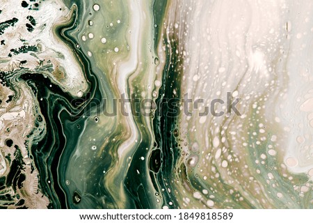 Abstract muted green bubbles and waves. Acrylic Fluid Art. Art Deco marbling background or texture. Royalty-Free Stock Photo #1849818589