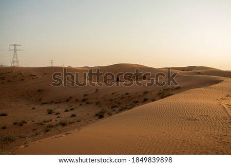 Picture of a boy in the desert. Outdoors