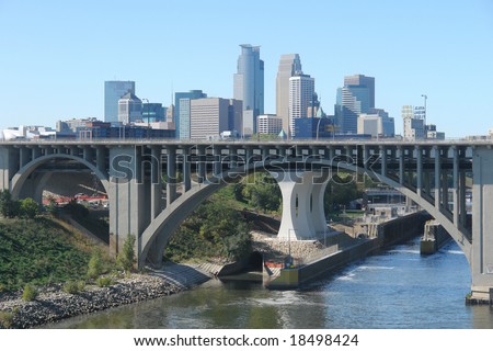         A picture of the Minneapolis skyline beyond the 35w bridge