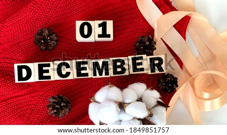 December 1 on wooden cubes .Next to the cones, cotton and tape.Winter.Calendar for December.