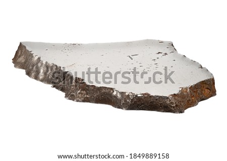Iron Meteorite Sliced, close up of rock from space on white background