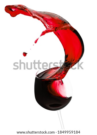 red wine splash from glass isolated on a white background