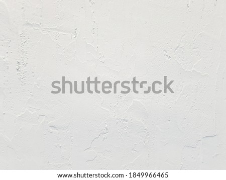 abstract white background with rough texture. vintage plaster wall. white partition for interior or exterior house decoration zone. minimal retro or loft style concreate wall.