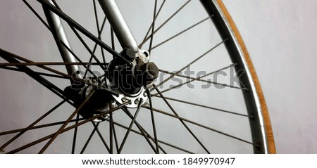 bicycle wheel on white background. selected focus on the middle of the wheel  