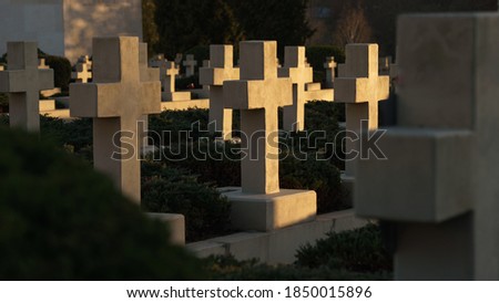 View of crosses on graves at sunset in Ukraine