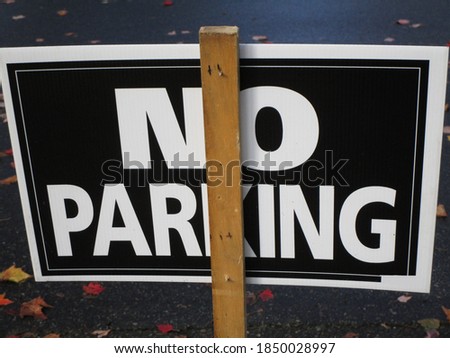 No Parking Sign with wooden stand