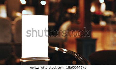 Restaurant cafe menu. Menu frame standing on wood table in Bar restaurant cafe. space for text marketing promotion