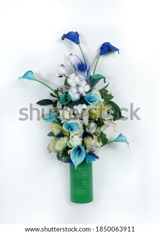 Colored Calla lilies and white cotton flowers on a white background.
St. Valentine's Day. Beautiful  flowers            