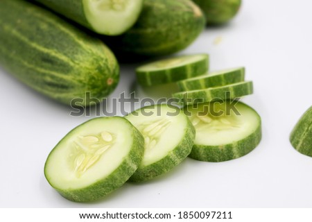 ripe cucumber isolated on white background clipping path.raw cucumber isolate on white background.