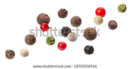 Falling Pepper mix of black, red, white and allspice peppercorns isolated on white background with clipping path Royalty-Free Stock Photo #1850206966