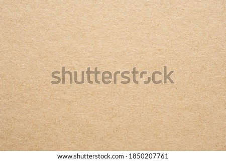 Brown eco recycled kraft paper sheet texture cardboard background