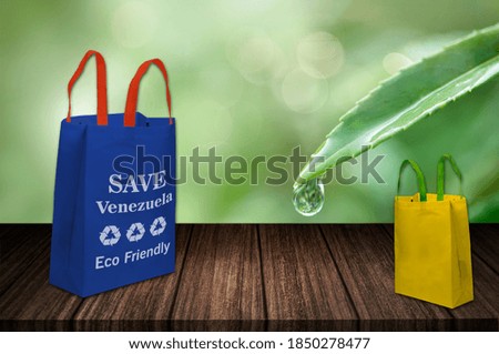 Save Venezuela, eco friendly green bag on table, non woven fabric bag, future of Pakistan, Use ECO Bag