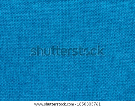 Blue Elegant Decorative Fabric Material Textile Surface Pattern. Colorful Wallpaper.