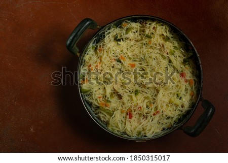 Homemade and healthy Shavige upittu on a brown background