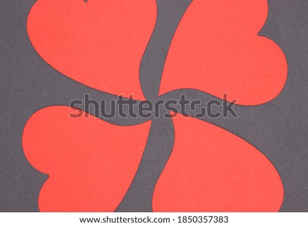 red paper heart on colorful background