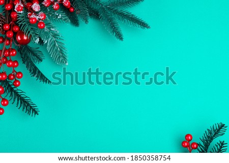 Christmas decorations on the blue background with copy space for your text.
