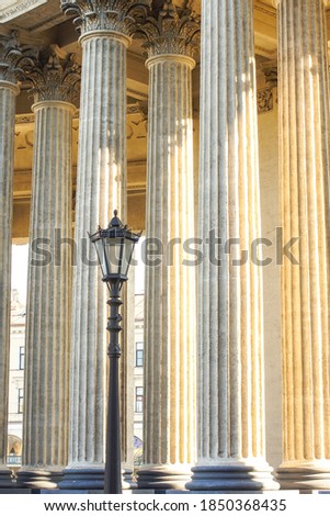 columns at the parliament , a symbolic photo of architecture, stability, history