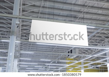 Blank White Supermarket Banners Hanging From Ceiling. Hangers Mockup Ready For Branding Or Advertising