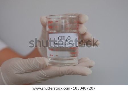 Clear solution of formaldehyde in the beaker Royalty-Free Stock Photo #1850407207