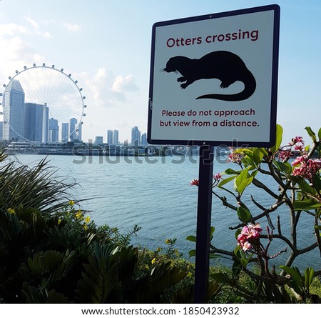 otters crossing, gardens by the bay, singapore