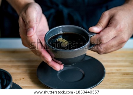 Man making coffee in the kitchen.
Delicious coffee image.