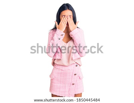 Young beautiful latin girl wearing business clothes rubbing eyes for fatigue and headache, sleepy and tired expression. vision problem 