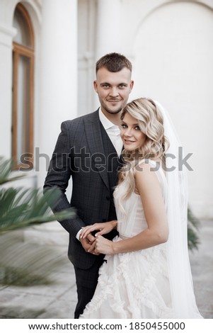 portrait of a happy bride and groom, wedding love emotions