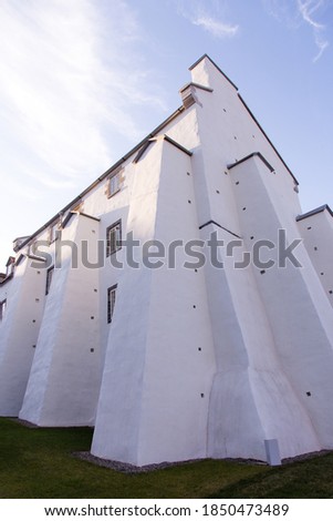 Low angle vertical view of the 18th Century Dauphine Redoubt east facade seen during a sunny Fall morning, Quebec City, Quebec, Canada Royalty-Free Stock Photo #1850473489