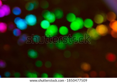 Blured rainbow holographic stars abstract patterned background