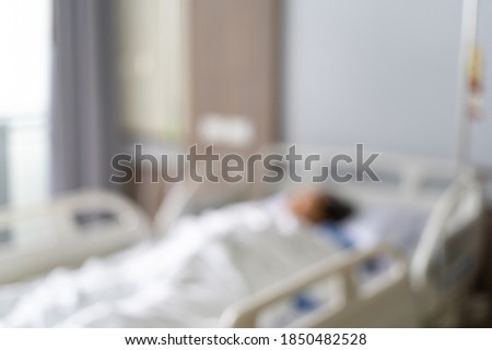 The blur of the sick patient get treatment on the bed inside the hospital elegant beautiful. picture for background. Hospital concept