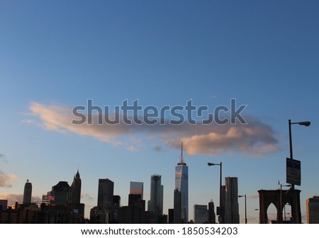 New York skyline seen from Brooklyn at evening.