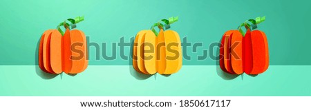 Paper craft autumn pumpkins overhead view - flat lay