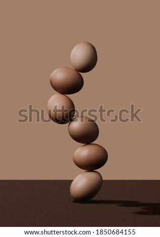 eggs in stability on a brown background 