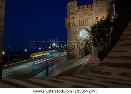 Puerta del Sol of Toledo, Spain by night. A medieval fortification within the Toledo old town, World Heritage Site by UNESCO. 