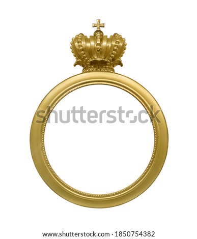 Golden round frame with a crown for paintings, mirrors or photo isolated on white background