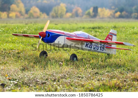 radio-controlled aircraft plane on a grassy airport, RC plane on grass,
RC aircraft Royalty-Free Stock Photo #1850786425